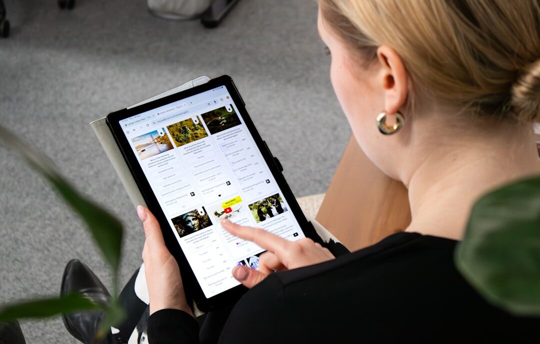 person browsing website on tablet